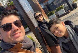 Família no termômetro de Gramado durante viagem com crianças